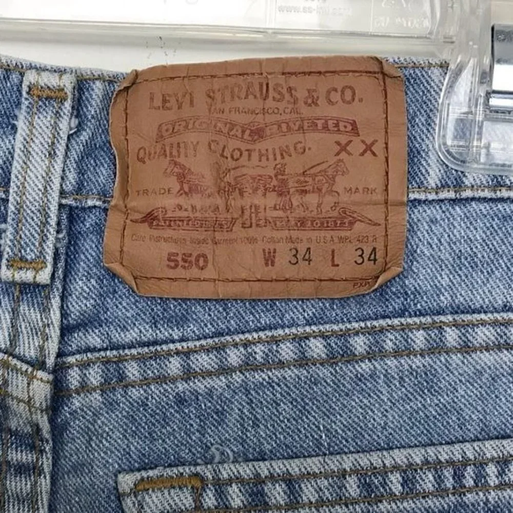 Vintage Levi's 550 Denim Hi Rise Cut Off Shorts with Rainbow and Star Patches